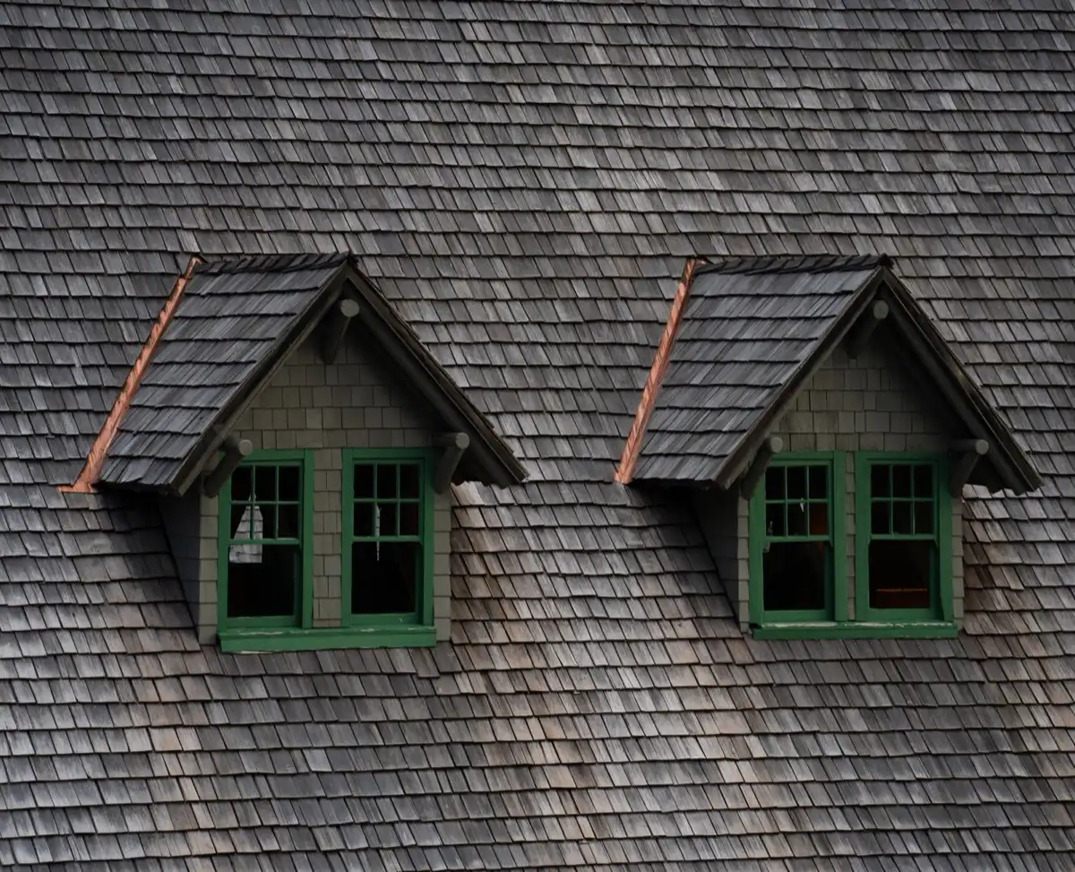 Dormers on a shingle roof in Scranton, PA, where step flashing and kickout flashing carry water past the walls
